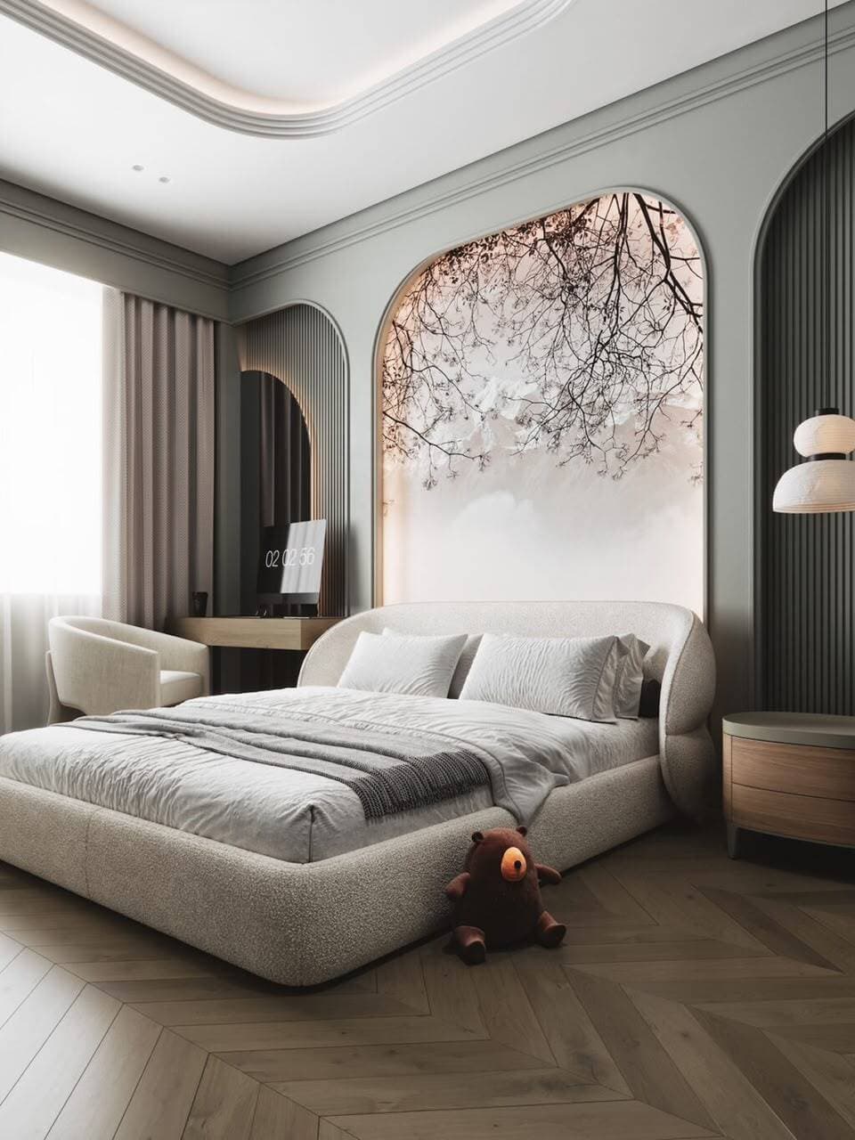 Elegant bedroom with an arched, softly lit headboard nook